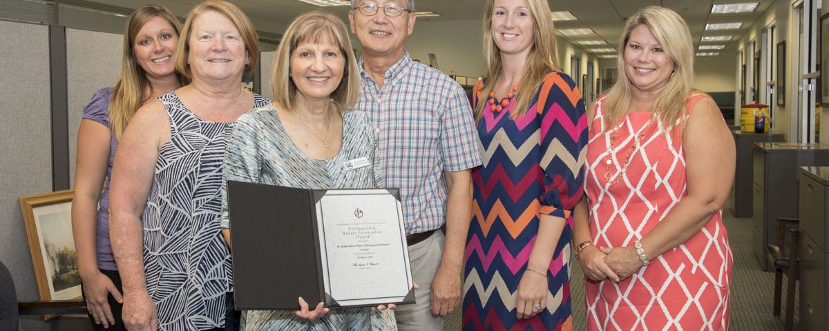 District budget staff with a Distinguished Budget Presentation Award