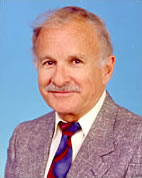 Headshot of Reid Hughes