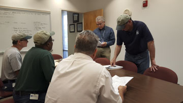 hurricane-matthew Staff meeting about Hurricane Matthew