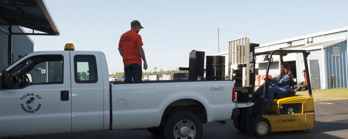 District staff donating surplus items at part of the REDI program