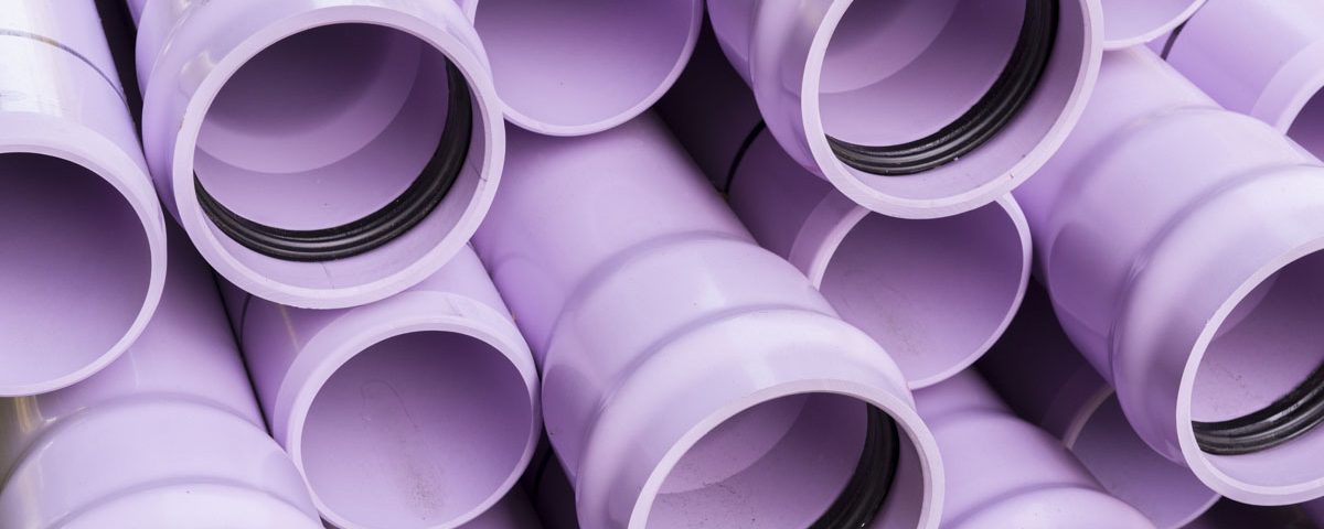 Stack of purple pipes used for reclaimed water lines