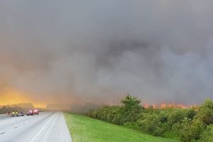 Highway covered with smoke from a wildfire
