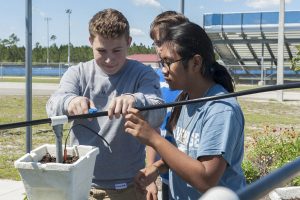 Blue School grant program students working in a garden