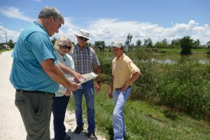 Dr. Erich Marzolf touring the Lake Apopka Marsh Flow-way with Dr. Ann Shortelle, Karl Hankin and Bob Nalway