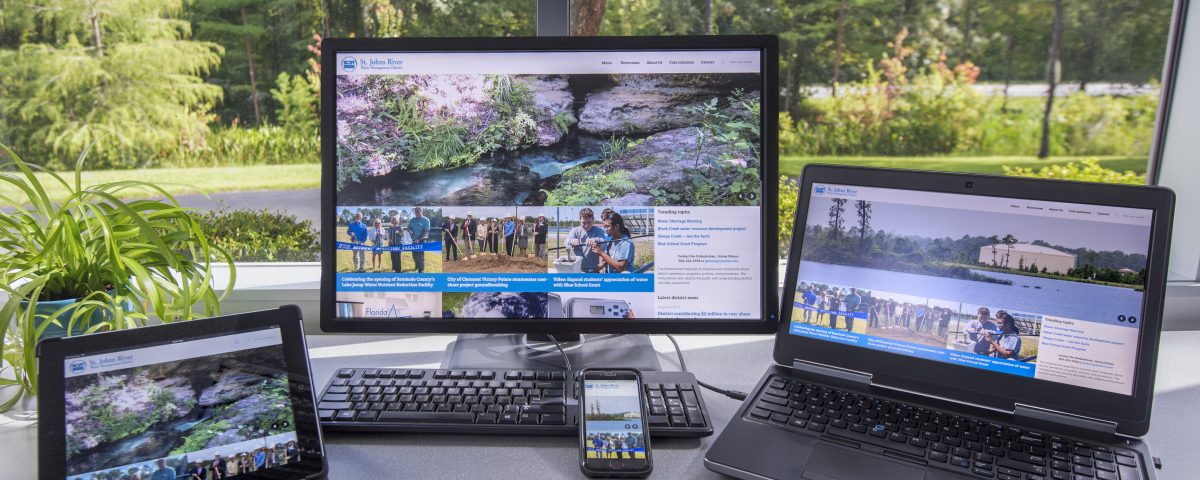 Tablet, phone, desktop and laptop computers showing the district's website