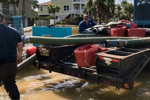District staff working to pump floodwaters at Vilano Beach