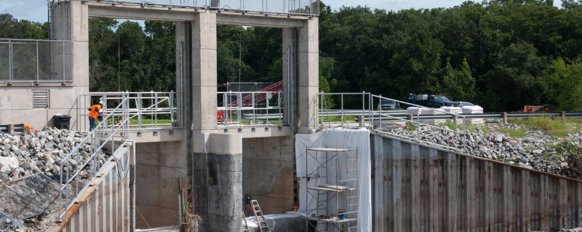 The Moss Bluff flood gate being resurfaced