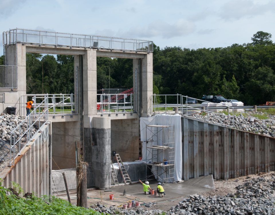 The Moss Bluff flood gate being resurfaced