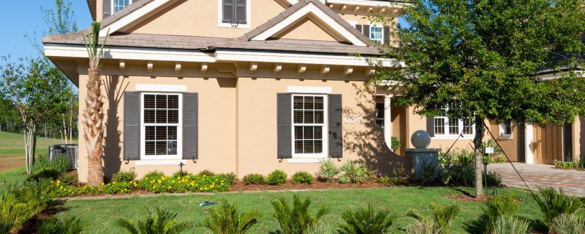 Gardens with drought-tolerant plants in front of a house
