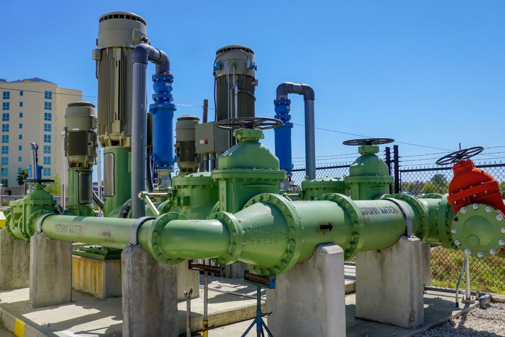 Large pumps and pipes with storm water labels