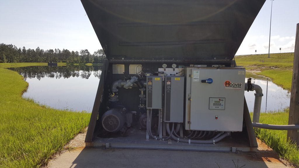Nocatee harvest pump view Water pump on the side of a stormwater pond