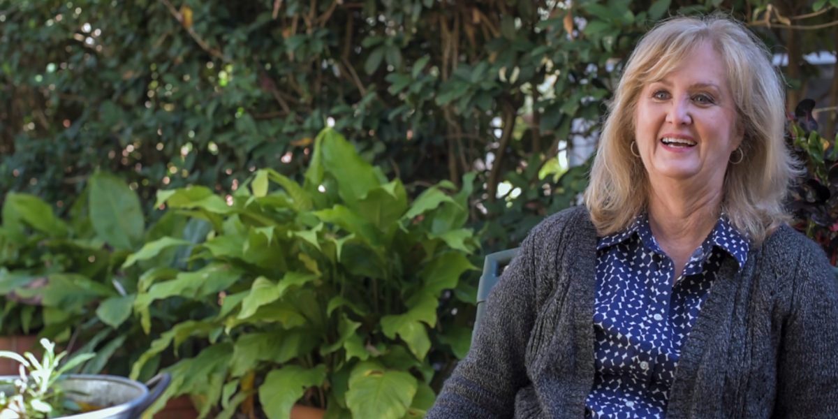 Deborah Weaver sitting in garden Deborah Weaver sitting in her garden
