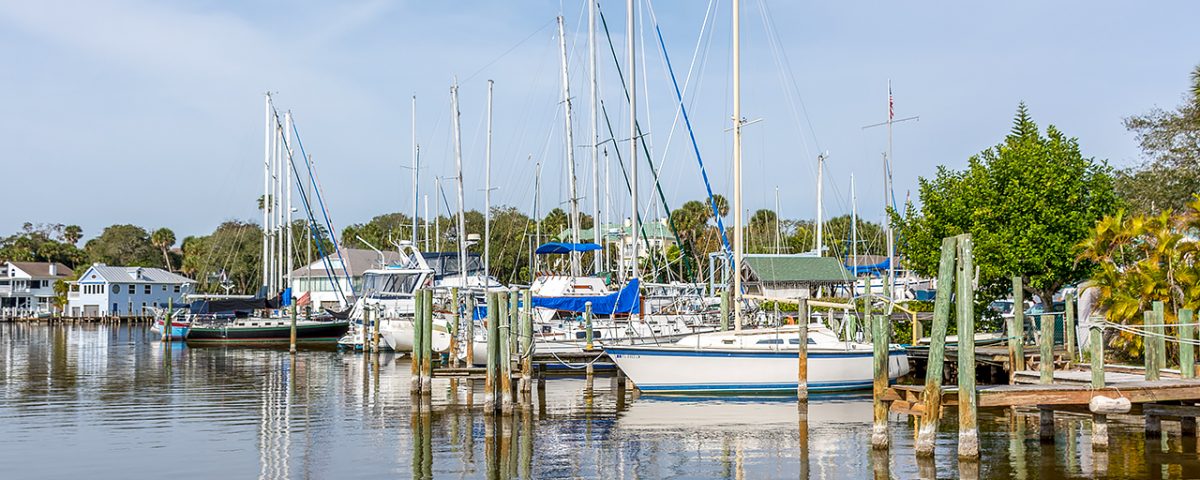 Sail boats docked in a harbour