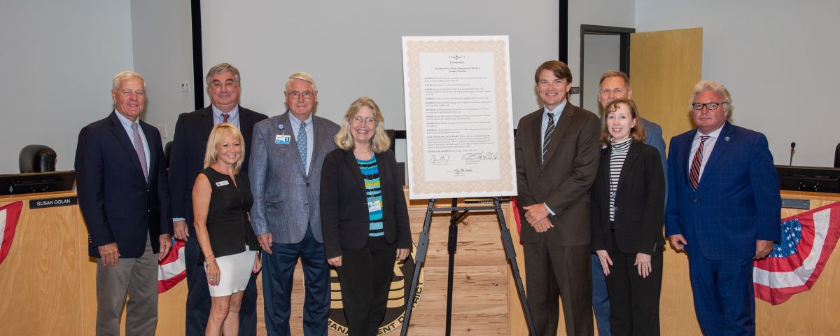 Dr. Shortel surrounded by board members