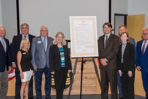 Dr. Shortel surrounded by board members