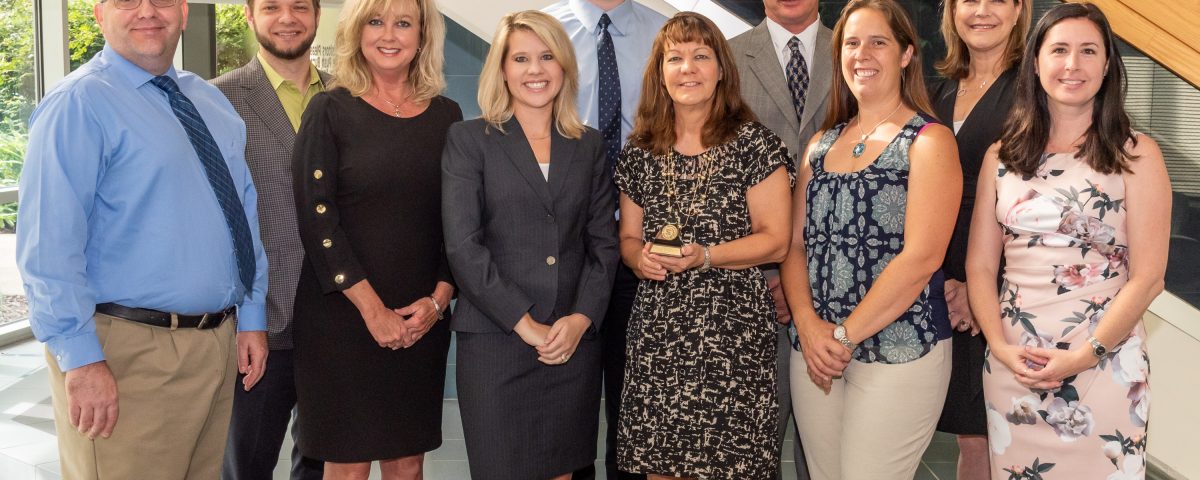 Communications staff posing for a picture