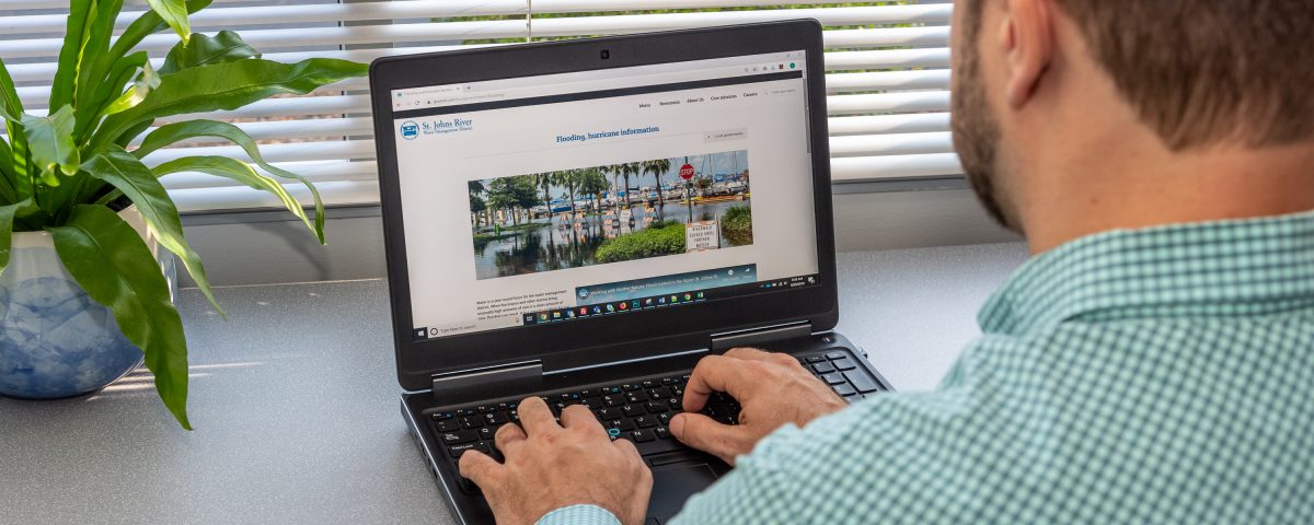 District staff on a laptop