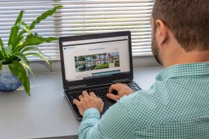 District staff on a laptop