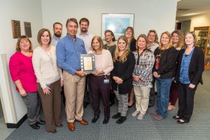Office of Financial Services staff receiving an award