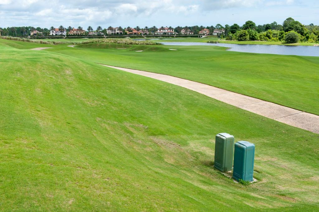 In front right are two control units that help golf course staff monitor turf conditions