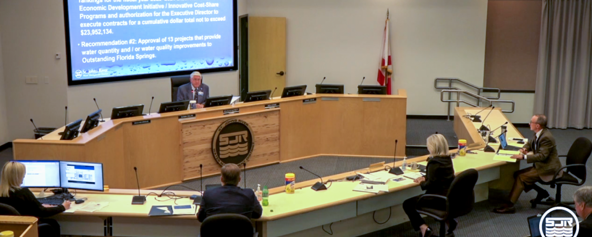 Douglas Burnett leading a Governing Board meeting