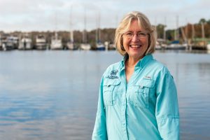 Dr. Ann Shortelle standing by a river