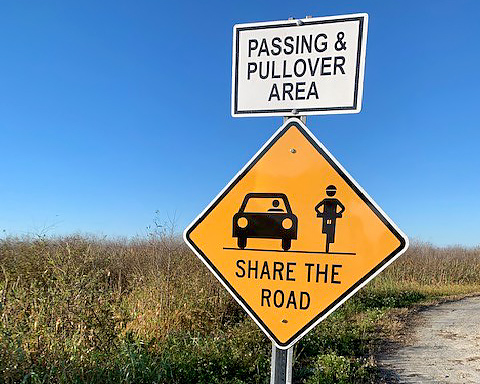 Share the road sign