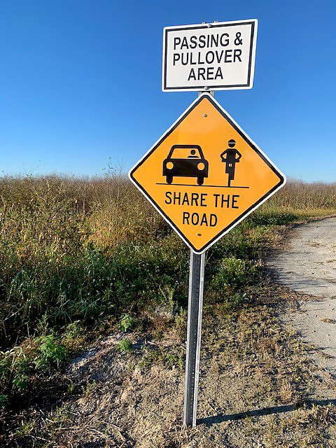 Share the road sign