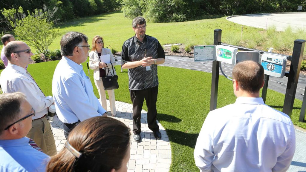 Matt Blowers demonstrates the use of irrigation timers to utility customers