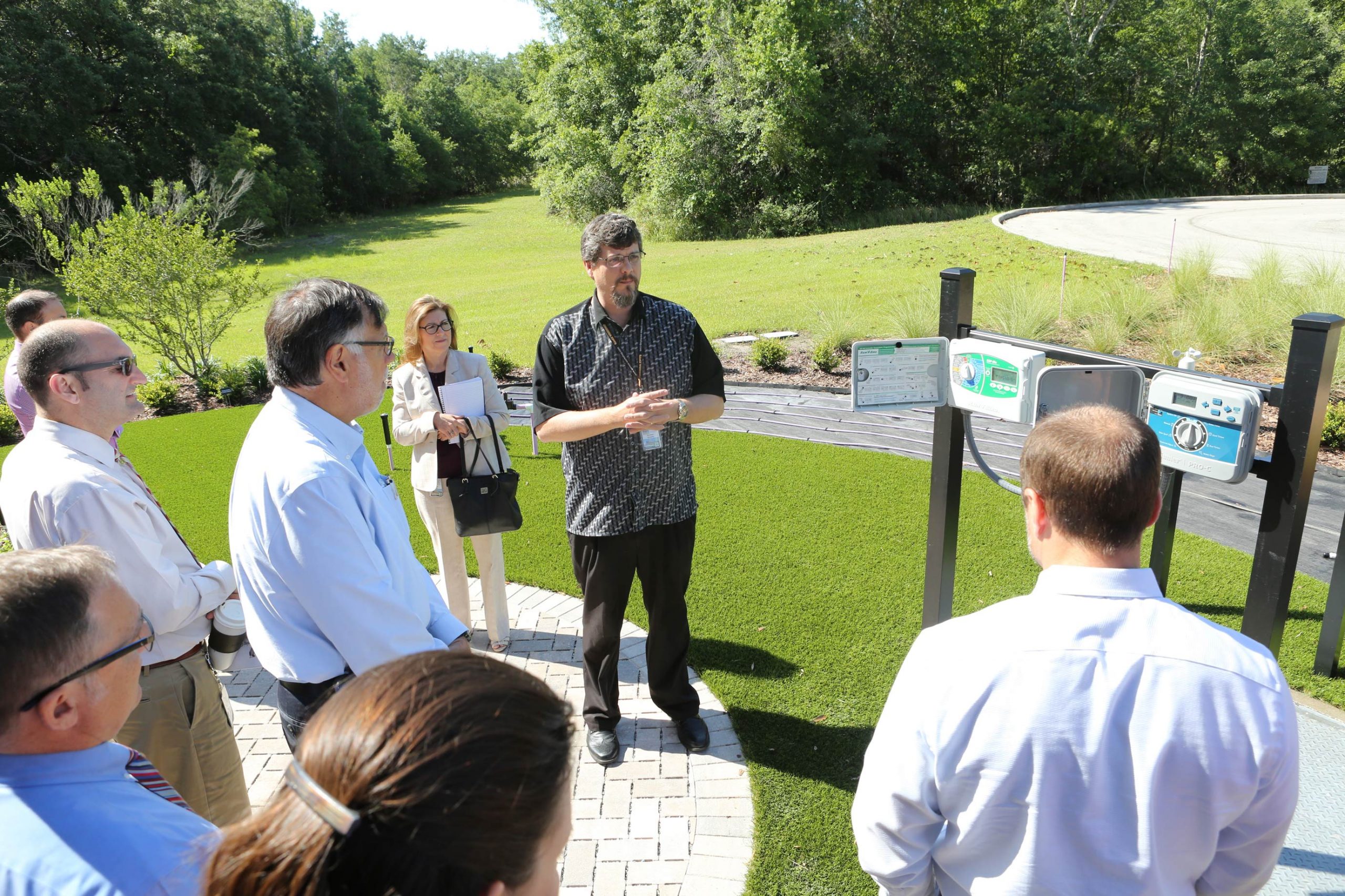 Matt Blowers demonstrates the use of irrigation timers to utility customers