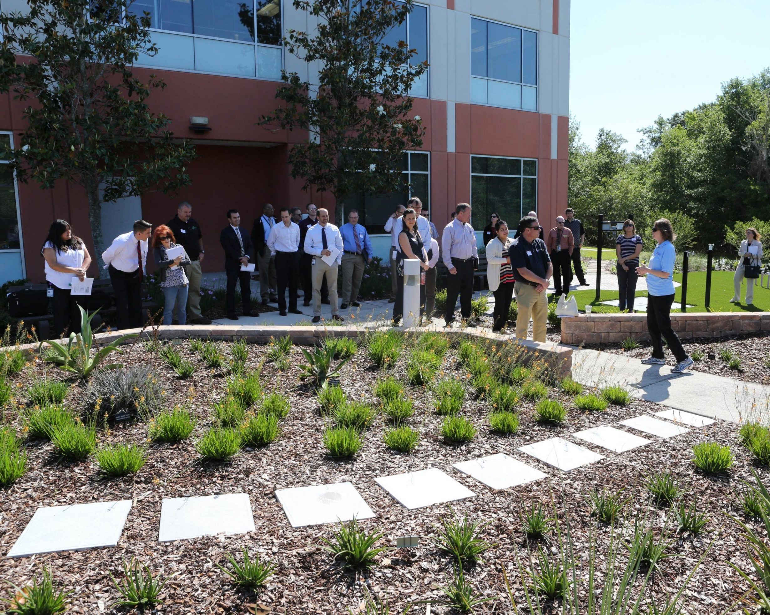 Terri Thill leads a tour in 2016 of the Florida-Friendly demonstration garden.
