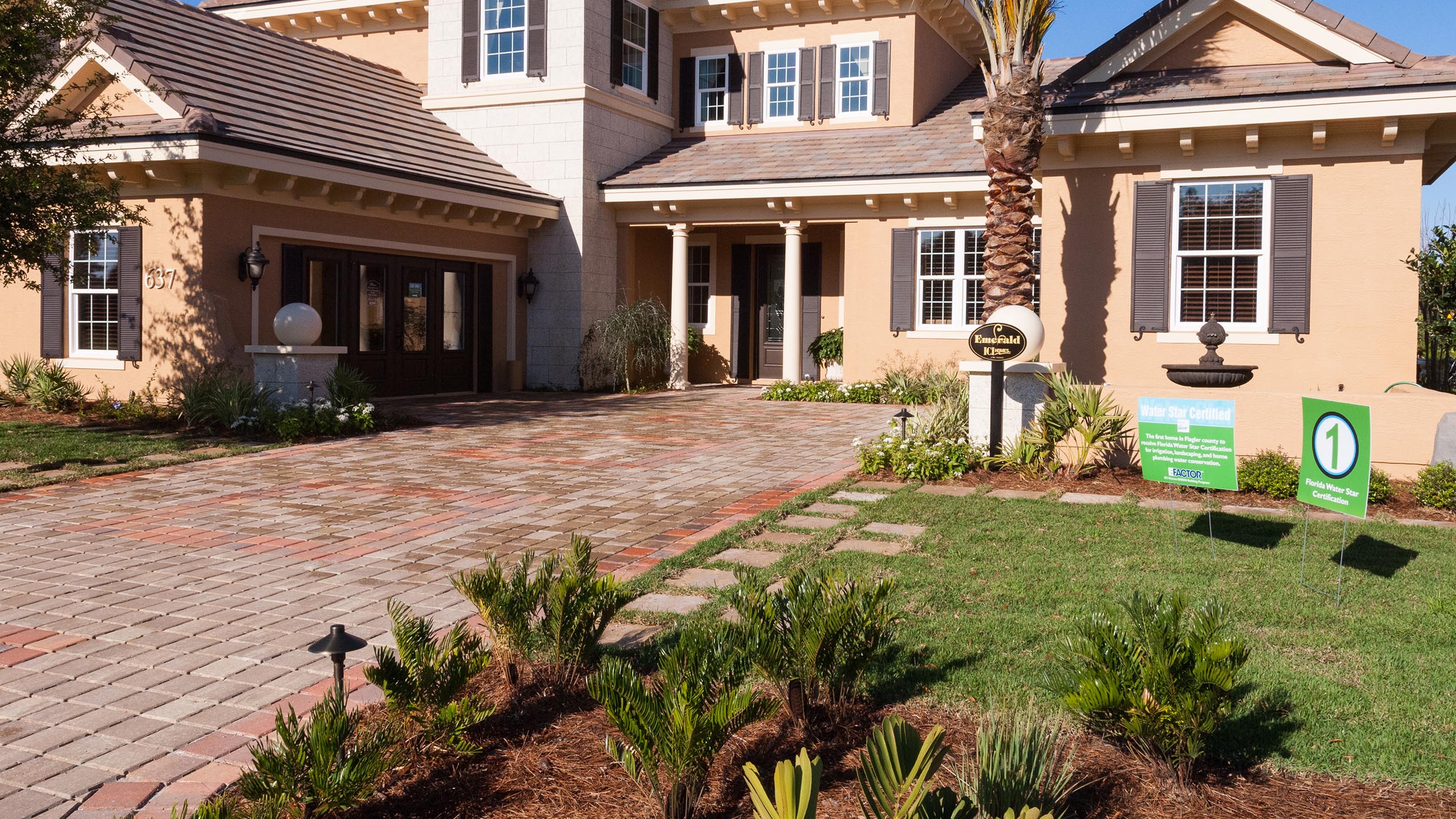 House with a stone driveway