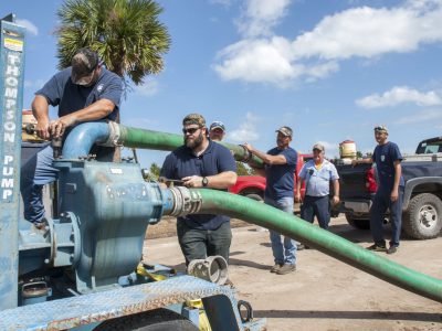 NR17-099-400x300 District staff setting up a portable water pump after Hurricane Matthew