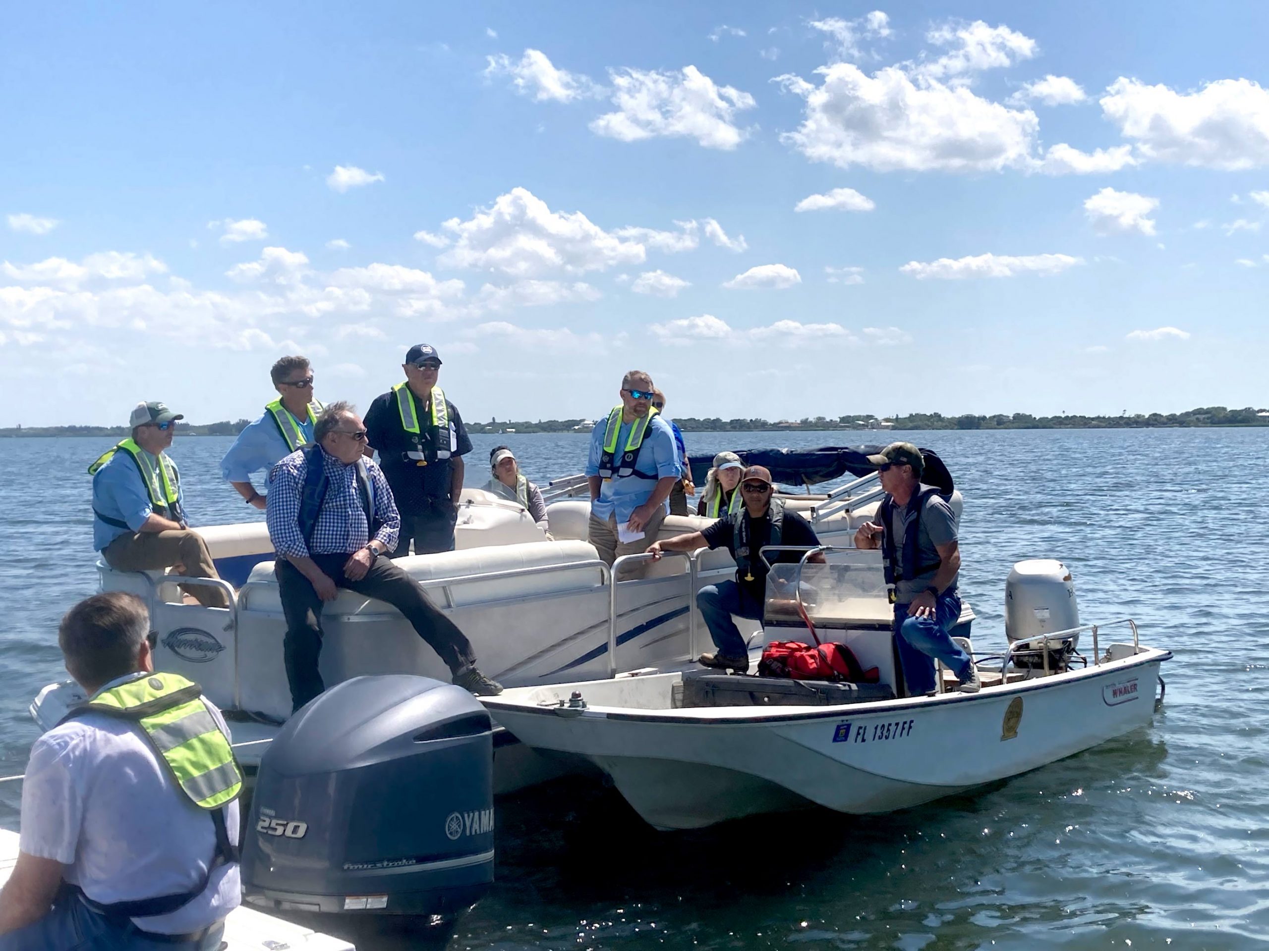 District employees on a boat