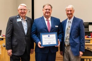 Mike Register accepting an award