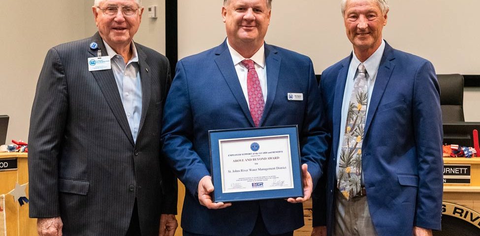 Mike Register accepting an award