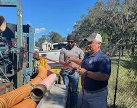 District employees prepare to deploy pumps in Seminole County