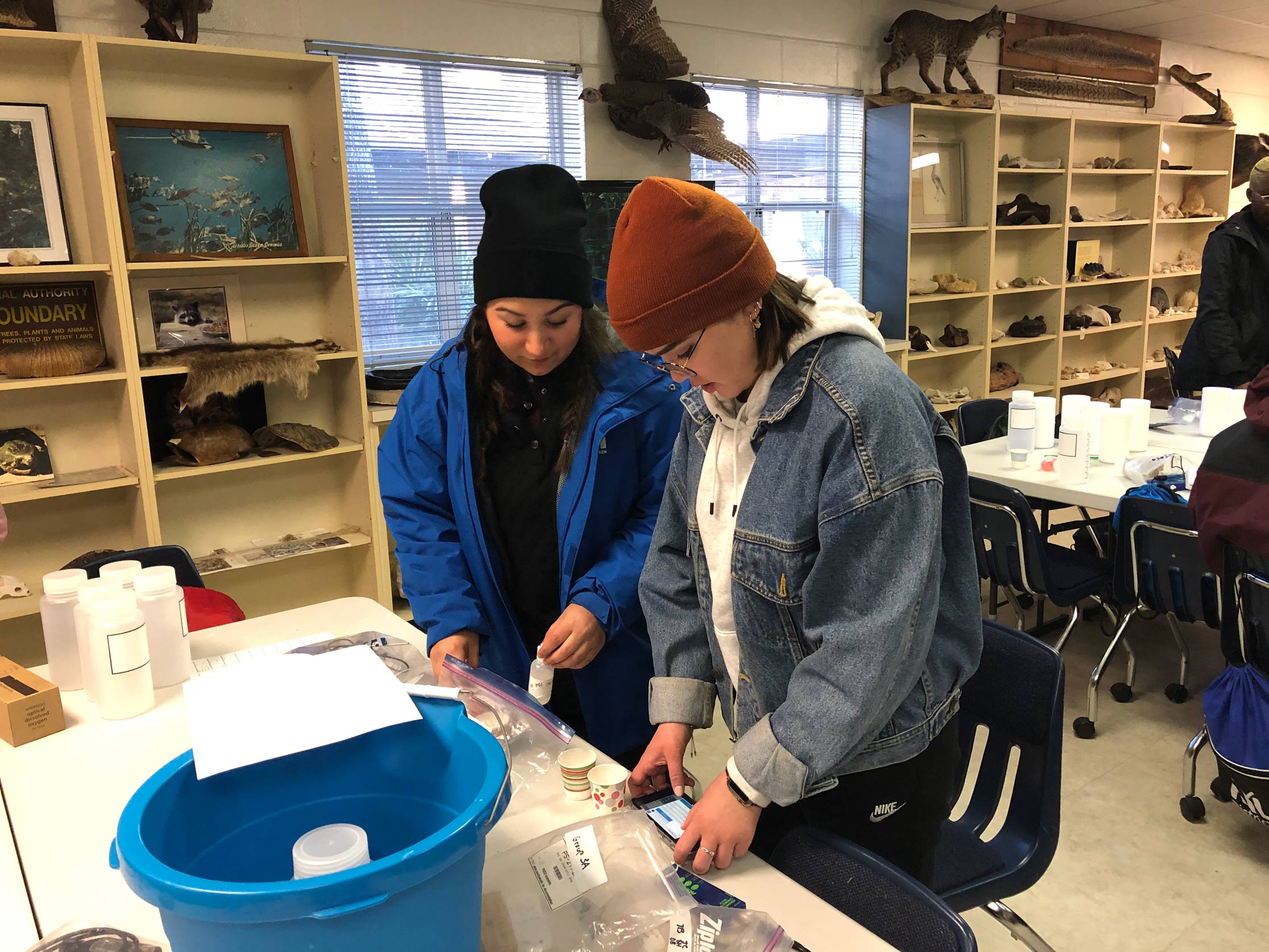 Students conducting a water quality test