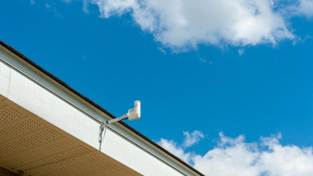 rain shut-off sensor attached to a roof