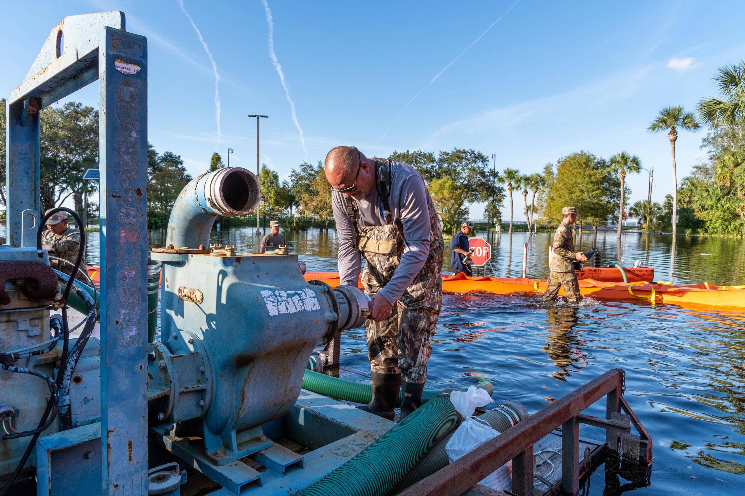 District workers set up flood pumps