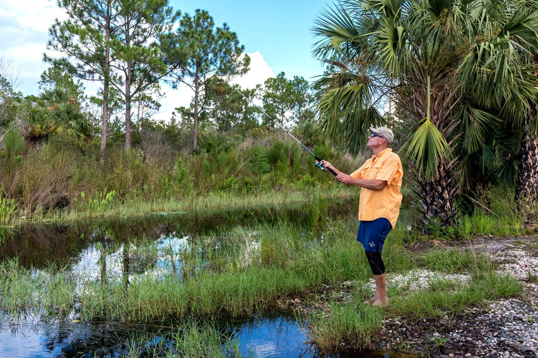 Man fishing on a shore