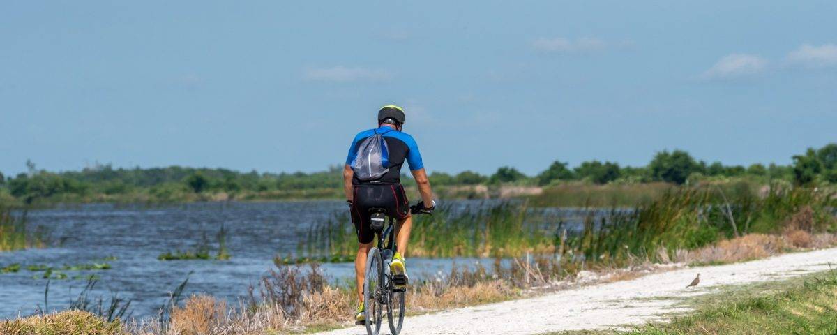 Man riding a bicycle on a trail