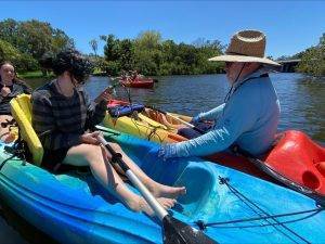 Students and instructors in canoes