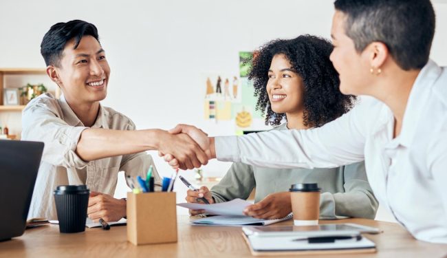 Two people shaking hands