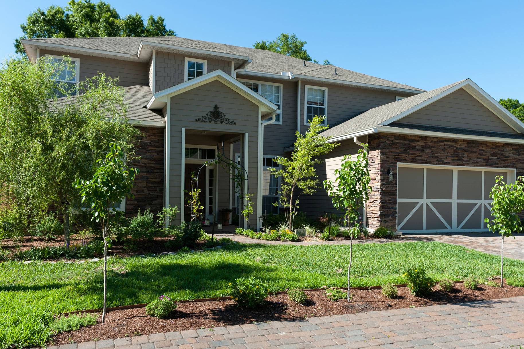 house New Home with manicured lawn