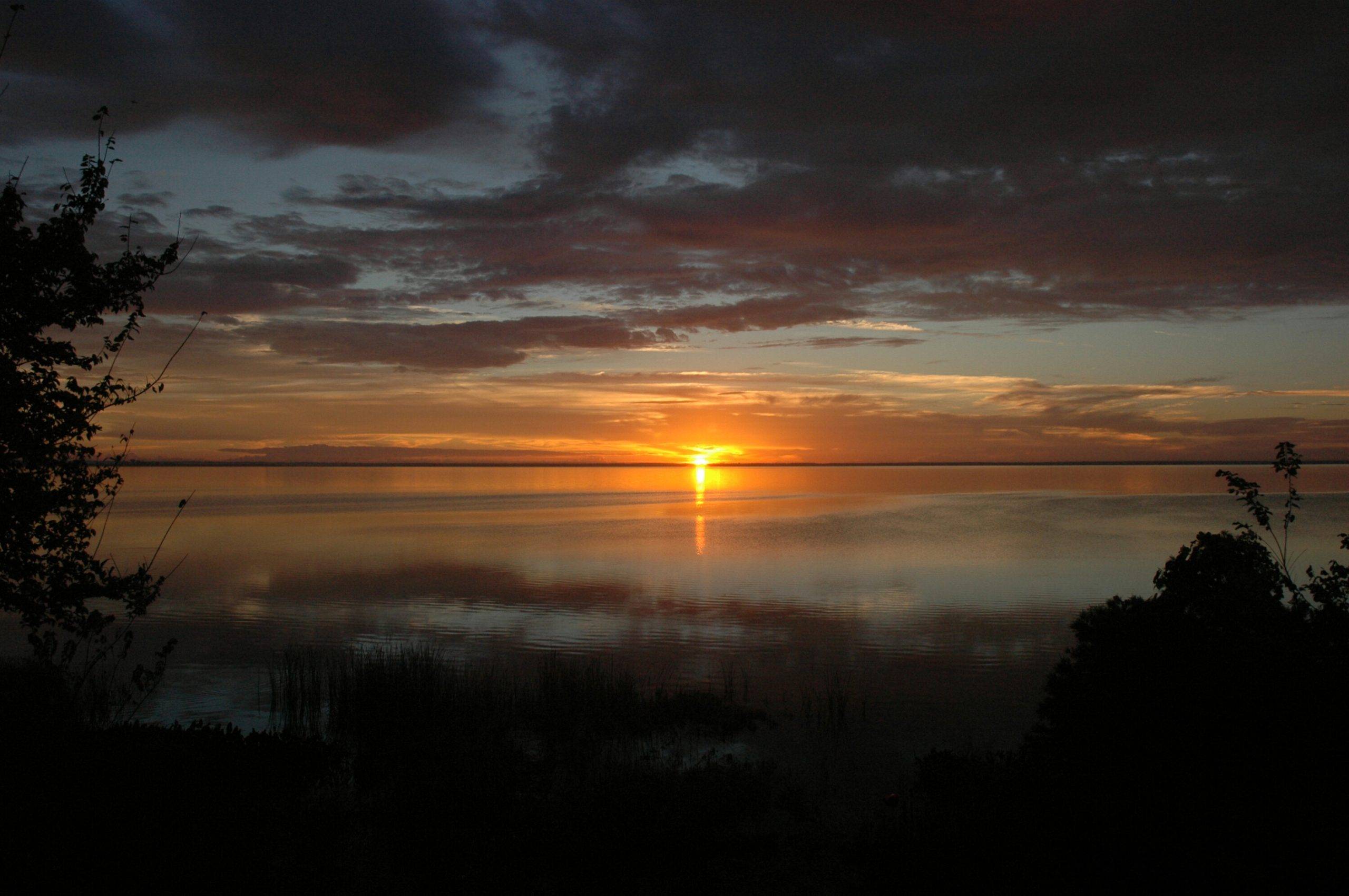 The sun rising on Lake Apopka