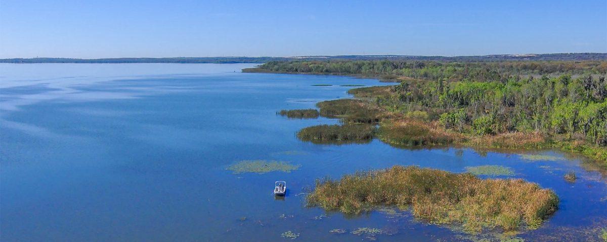 Aerial image of a large lake on a clear day