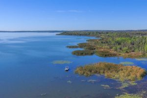 Aerial image of a large lake on a clear day