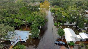 Aerial image of a flooded neighborhood street.