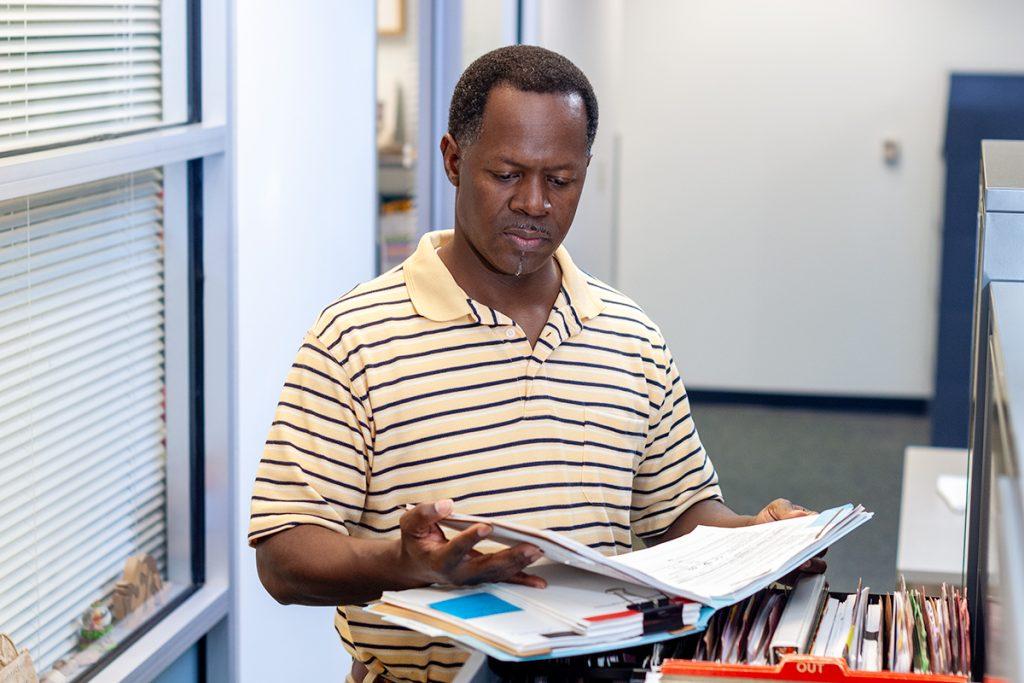 Person looking at a financial record